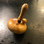 Toupie en buis à bouton - Toupies cadeau bel objet - Rouge et Noir