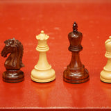 Pièces d'échecs Iroquoises en Bois de rose - Chopra - jeu d'échecs pièces d'échecs classiques - Rouge et Noir
