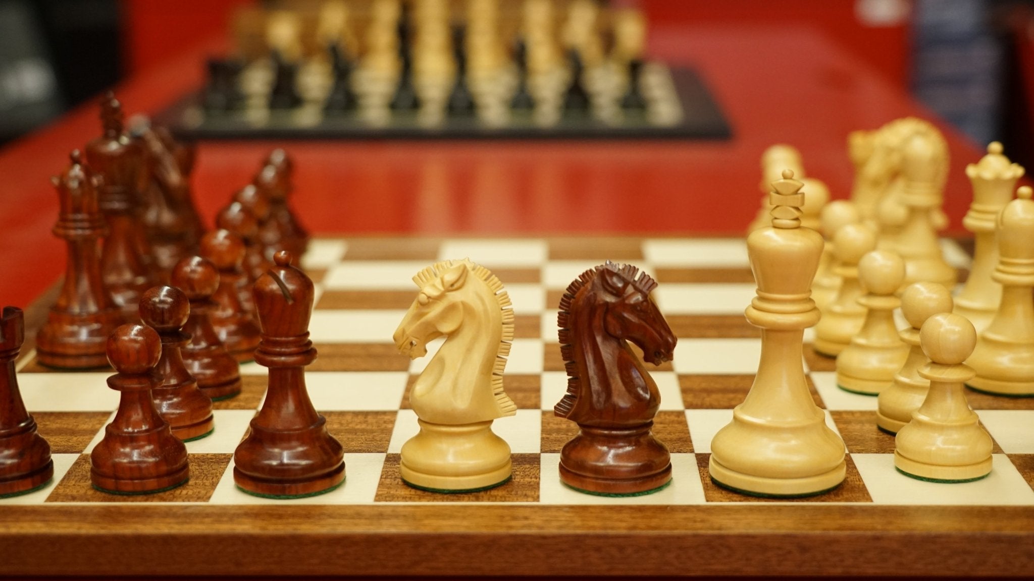 Pièces d'échecs Iroquoises en Palissandre - Chopra - jeu d'échecs pièces d'échecs classiques - Rouge et Noir